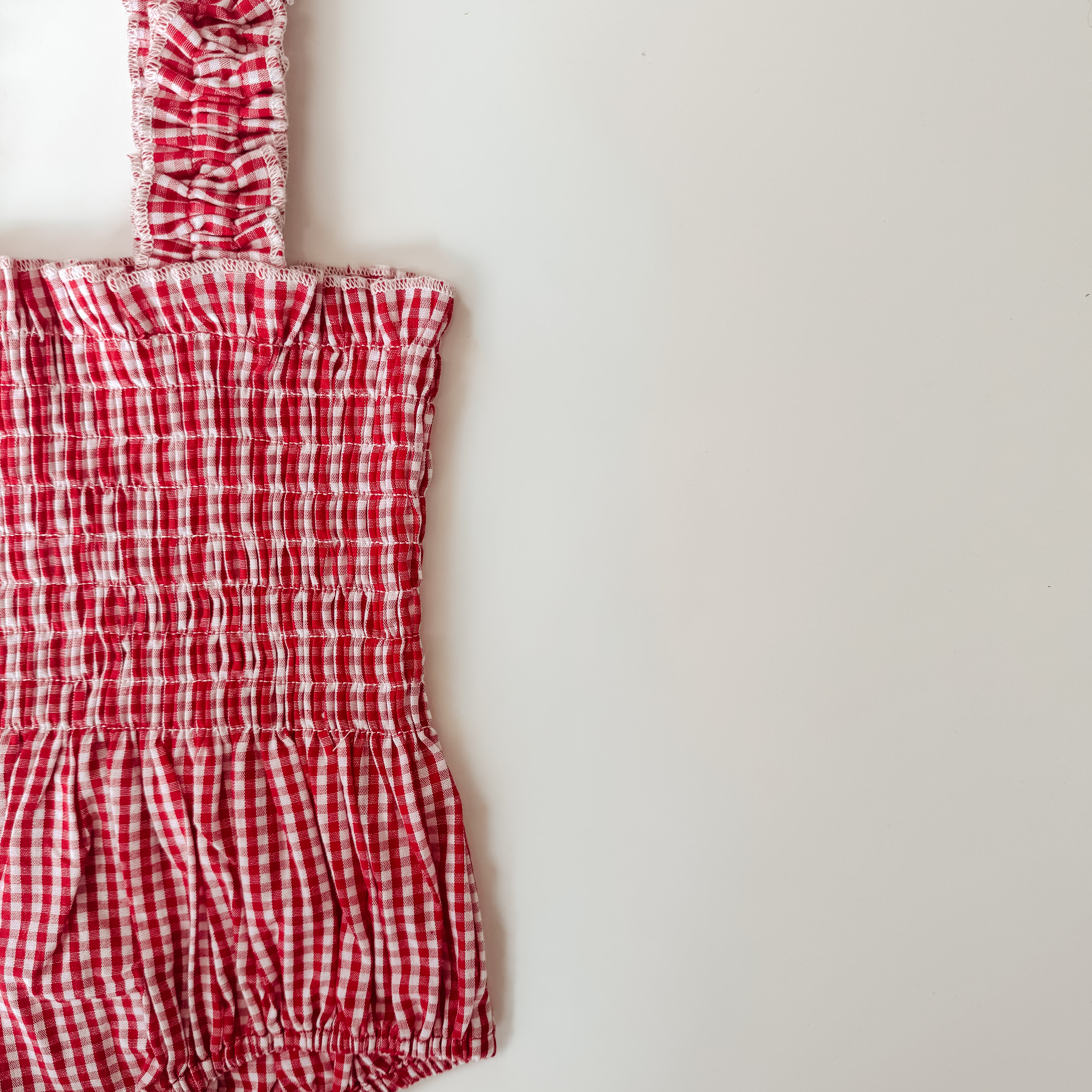 Cherry Red shirred romper by billy mae