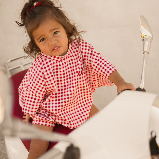 Cinnamon Baby red gingham romper – boutique baby romper exclusive to White Fox & Co NZ