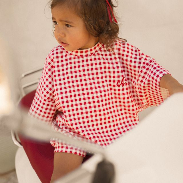 Cinnamon Baby red gingham romper – boutique baby romper exclusive to White Fox & Co NZ