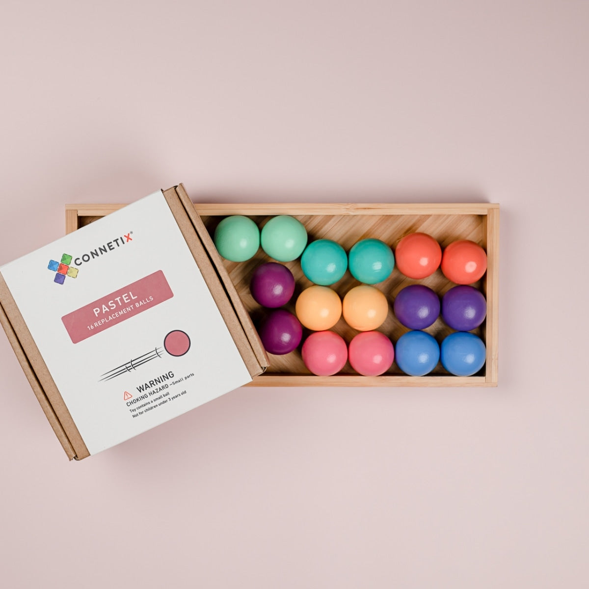 Pastel coloured Connetix balls displayed in packaging