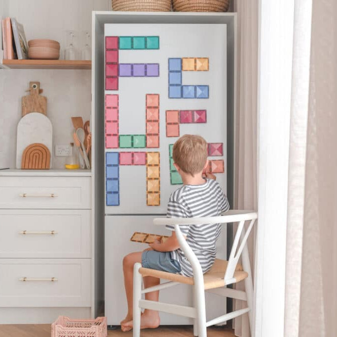 Child playing with Connetix Pastel Rectangle Pack