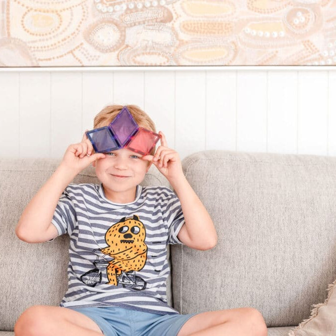 Children building creative 3D structures using Connetix Pastel Shape Expansion Pack