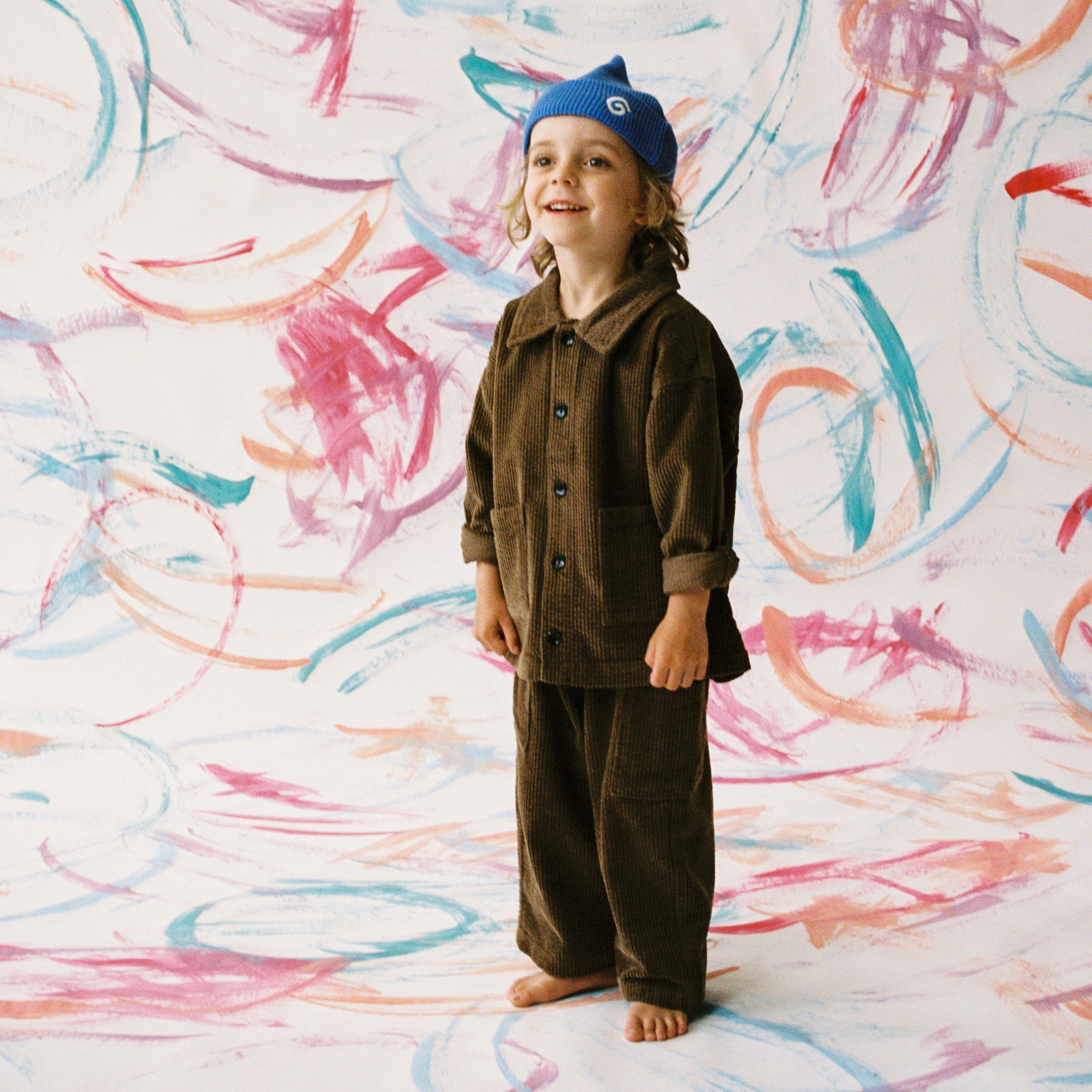 Organic cord pants in espresso colour, front view