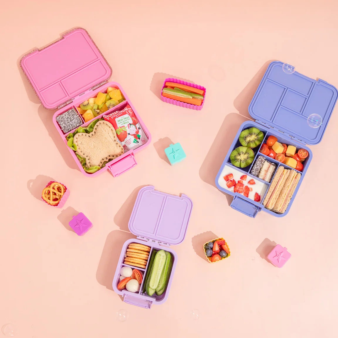 Inside view of MontiiCo Bento Three Floss Glitter lunchbox showing leakproof compartments