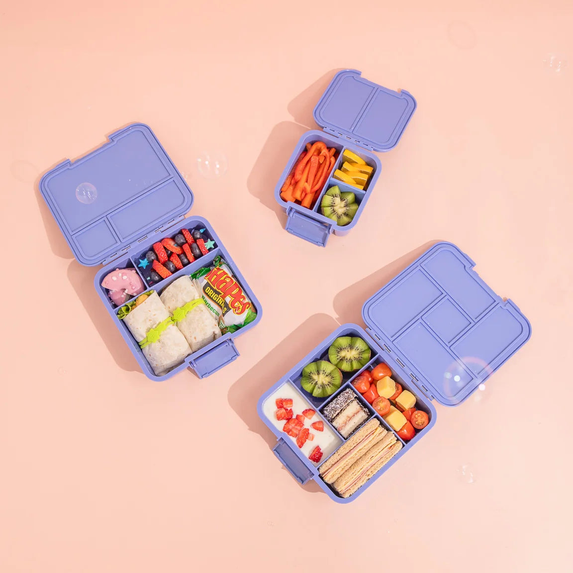 MontiiCo Bento Two lunchbox in Splash – open showing compartments