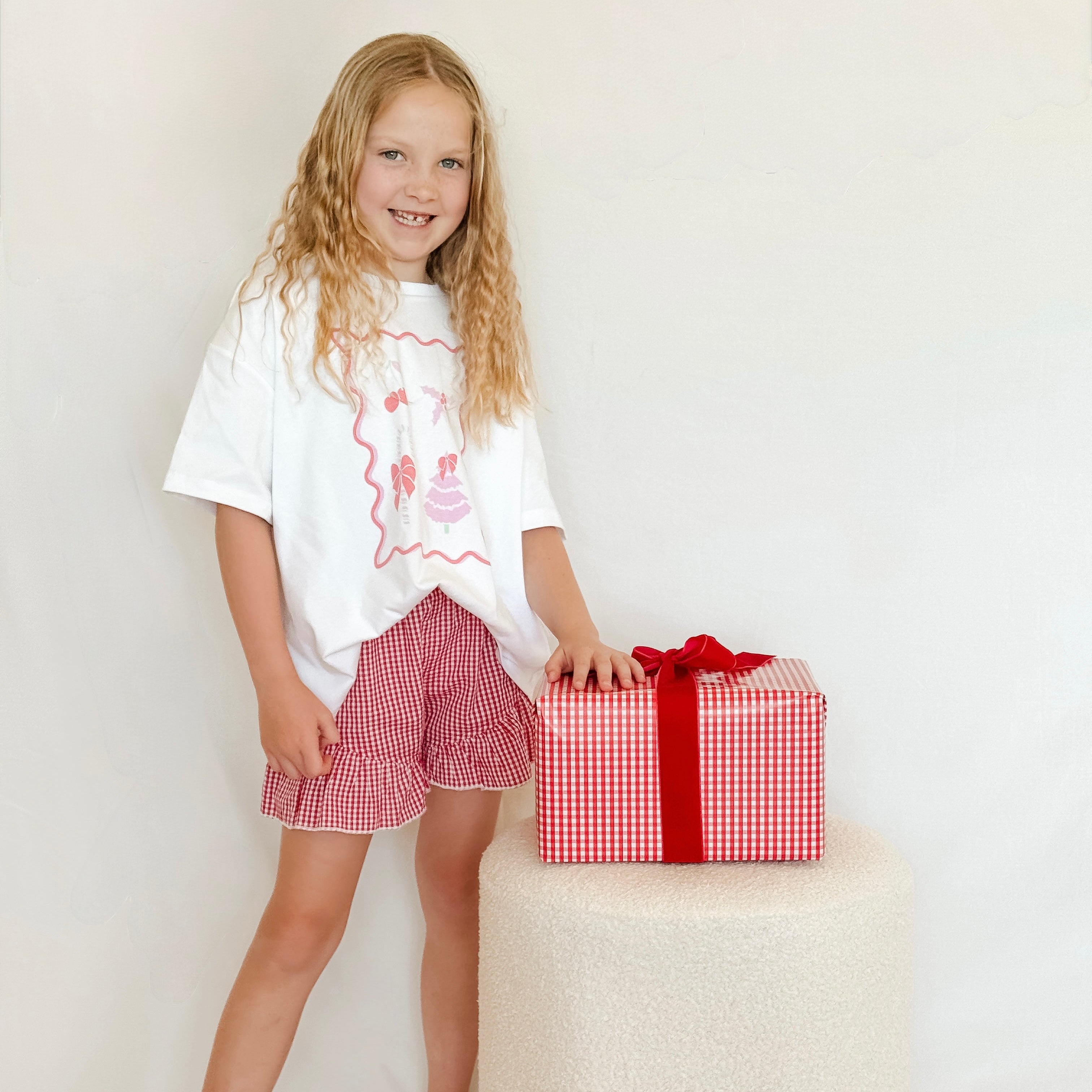 Sophia wearing billy mae christmas stamp tee far north, kerikeri, new zealand 