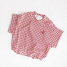 Red and white checkered shirt on a white background by Cinnamon Baby - Merci Collection. 