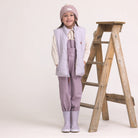 Child wearing Crywolf Rain Boots Heather outdoors