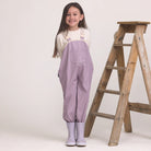 Child wearing Crywolf Rain Overalls Heather