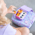 nside view of MontiiCo Bento Two Dusk lunchbox showing two leakproof compartments and removable divider