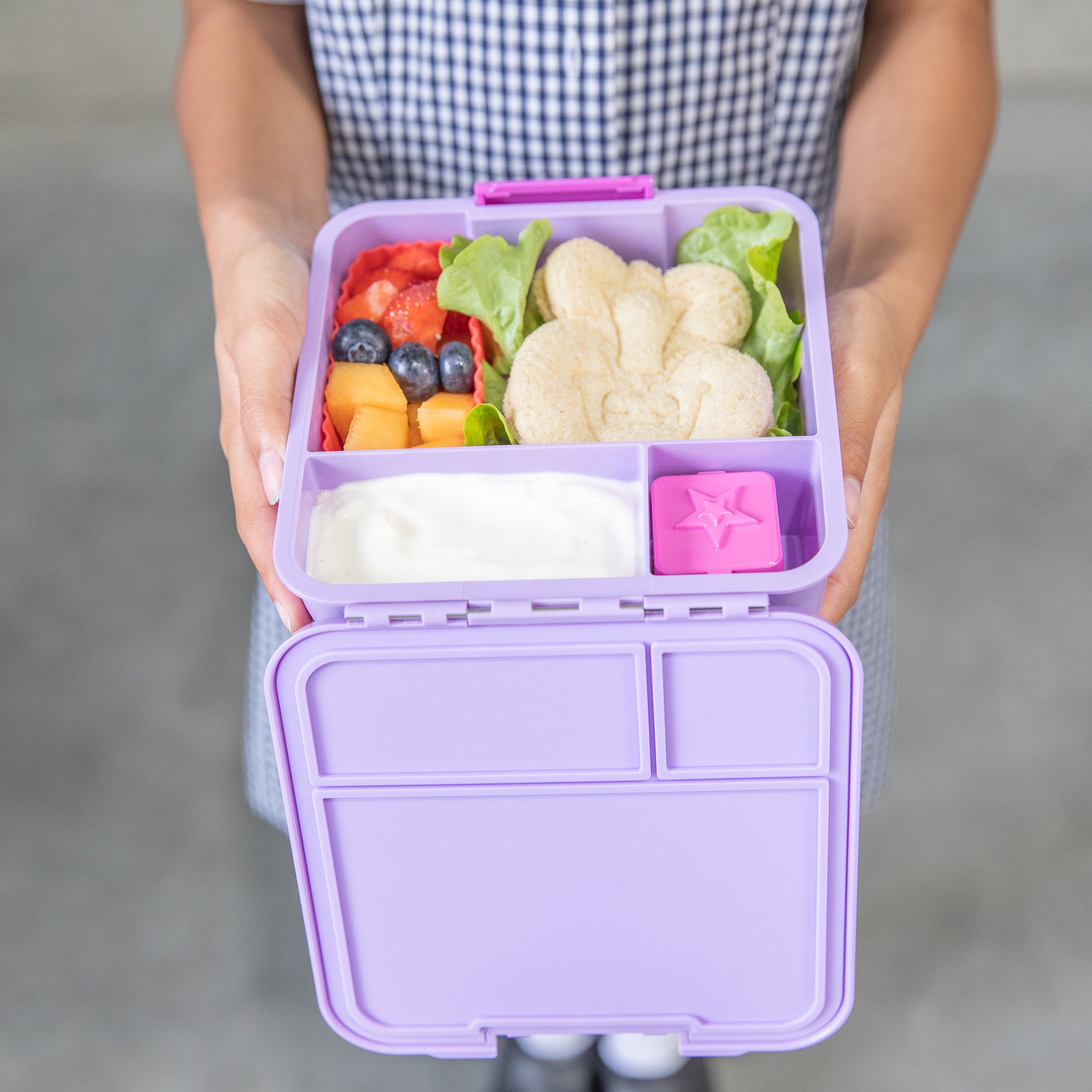 Inside view of MontiiCo Bento Three Dusk lunchbox showing three leakproof compartments