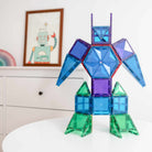 Children building structures with Connetix magnetic tiles