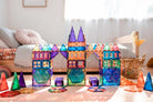 Children building structures with Connetix magnetic tiles