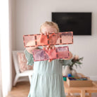 Child playing with Connetix Pastel Rectangle Pack