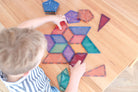 Children building creative 3D structures using Connetix Pastel Shape Expansion Pack