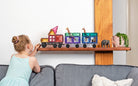 Children playing with Connetix Pastel Transport Pack – magnetic car and train pieces in action