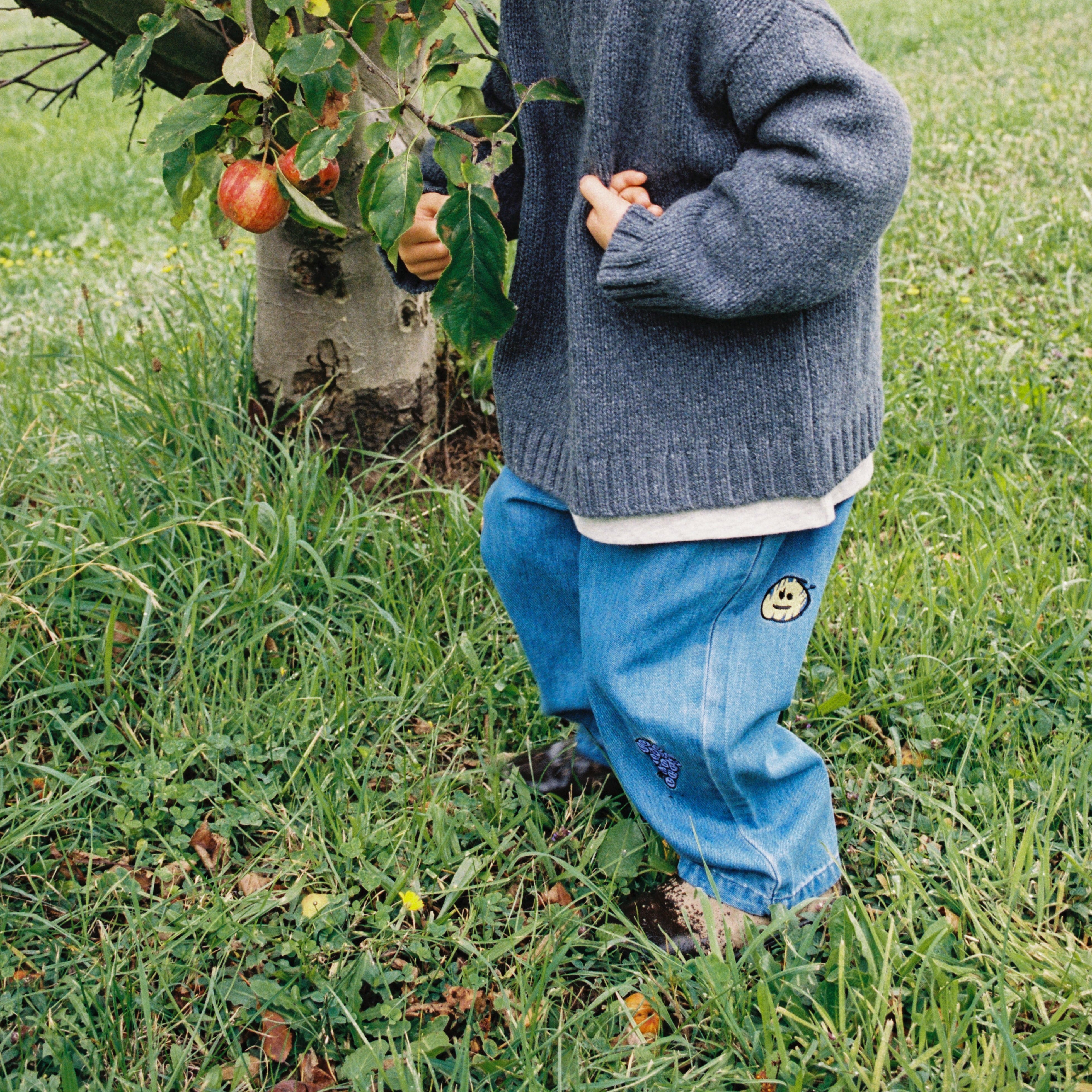 Grown organic cotton kids denim pants fruit embroidery detail