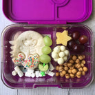 Lunch Punch Mermaid Cutter in use making a sandwich in purple lunchbox