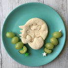 Lunch Punch Mermaid Cutter in use making a sandwich on plate