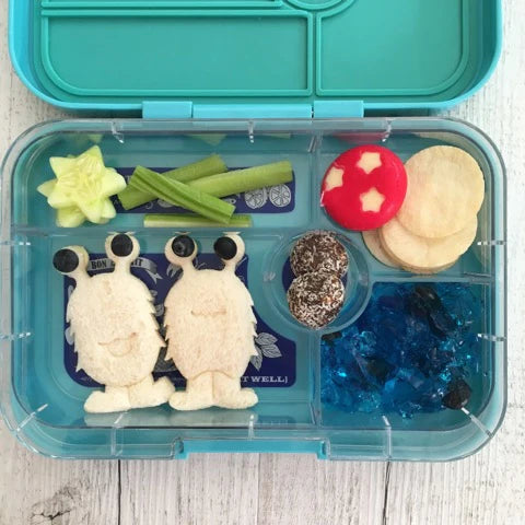 Styled lunch with sandwiches cut using Lunch Punch Space Set