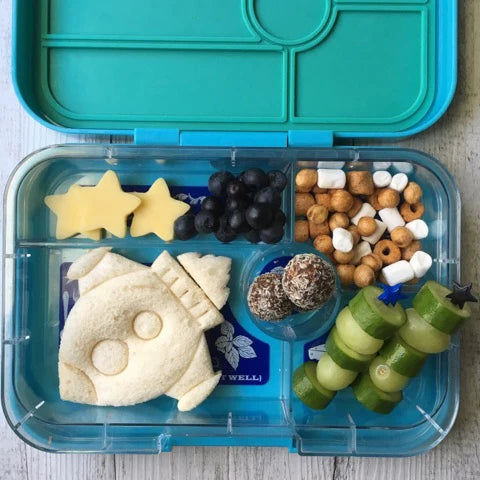 Styled lunch with sandwiches cut using Lunch Punch Space Set