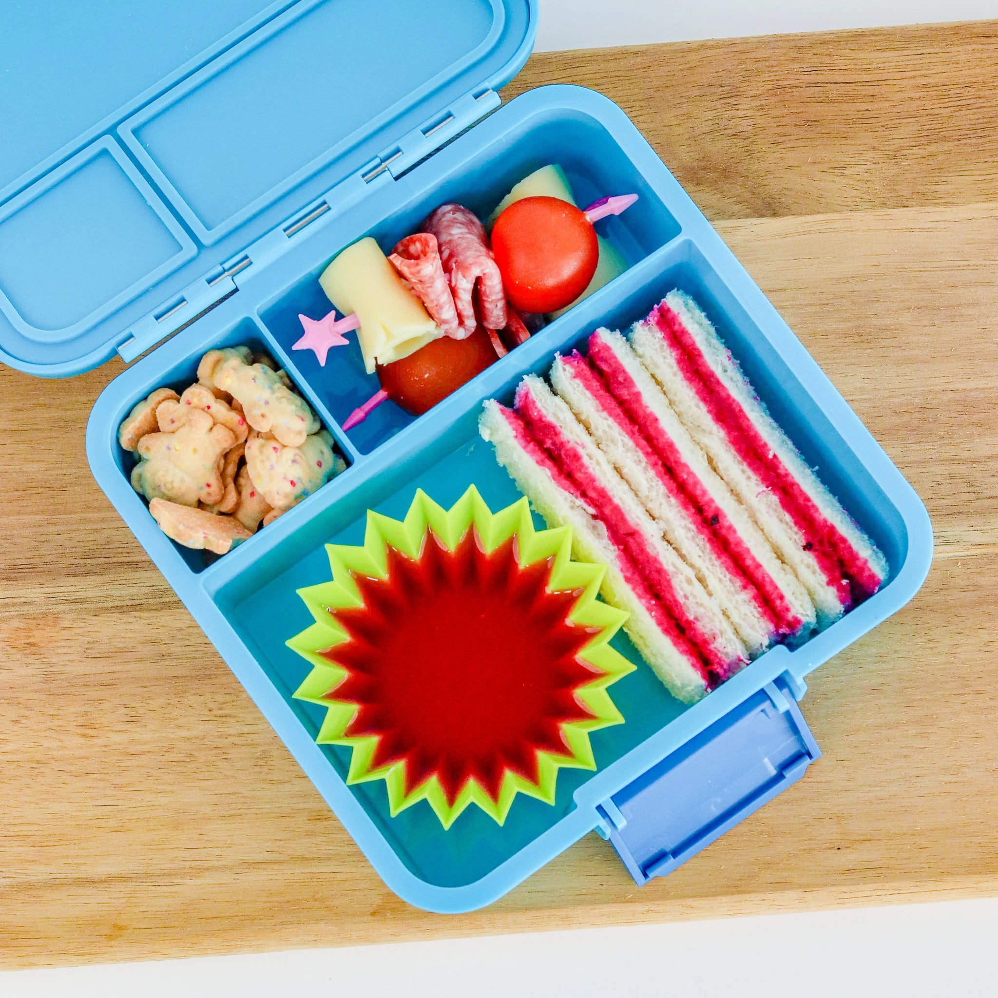 MontiiCo Bento Three Coastal lunchbox open showing leakproof compartments