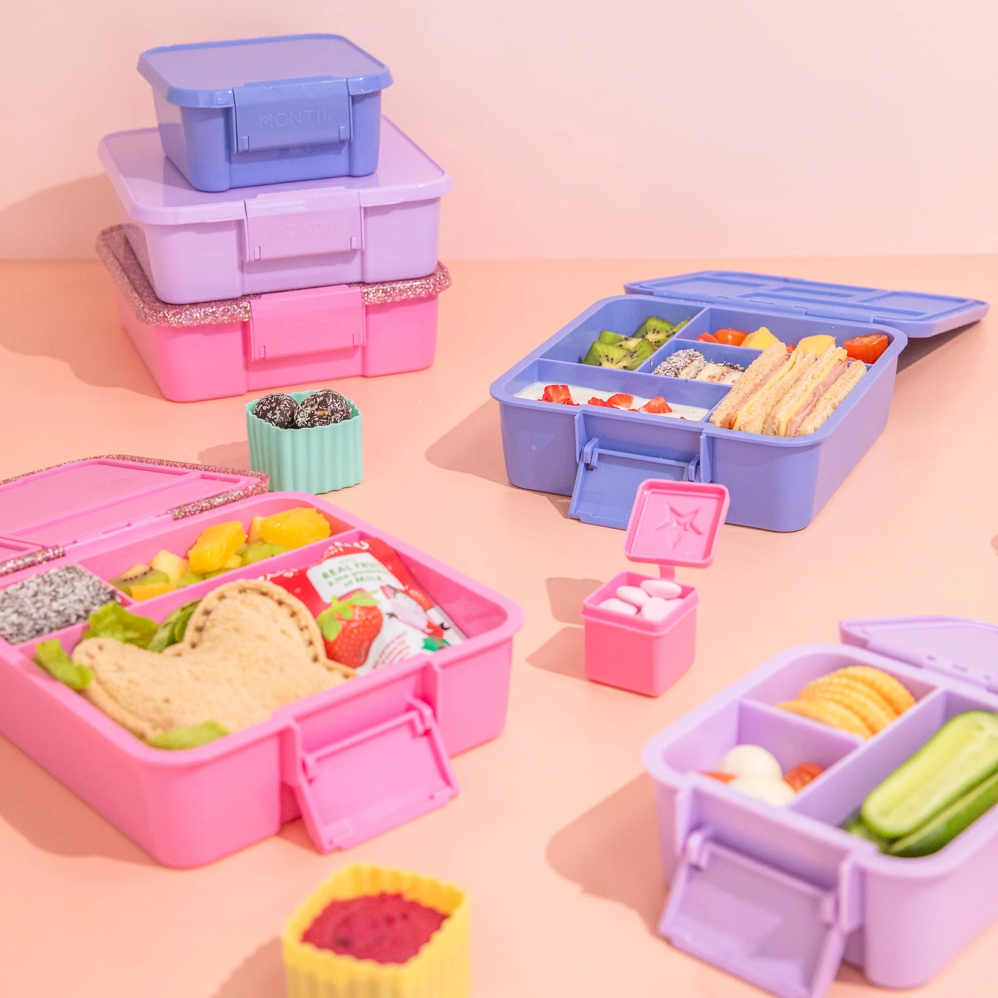 nside view of MontiiCo Bento Three Floss Glitter lunchbox showing leakproof compartments
