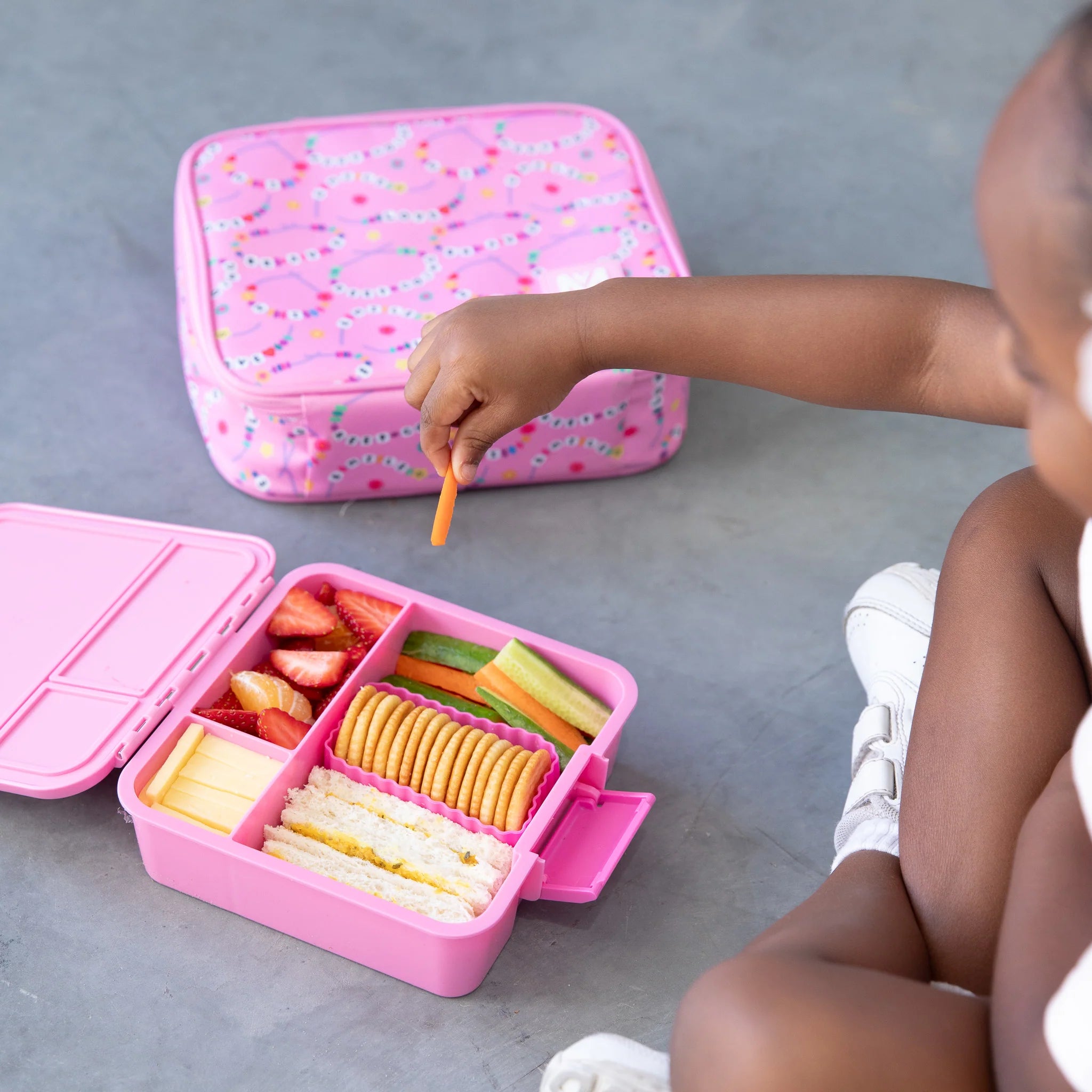 Inside view of MontiiCo Bento Three Floss lunchbox showing three leakproof compartments