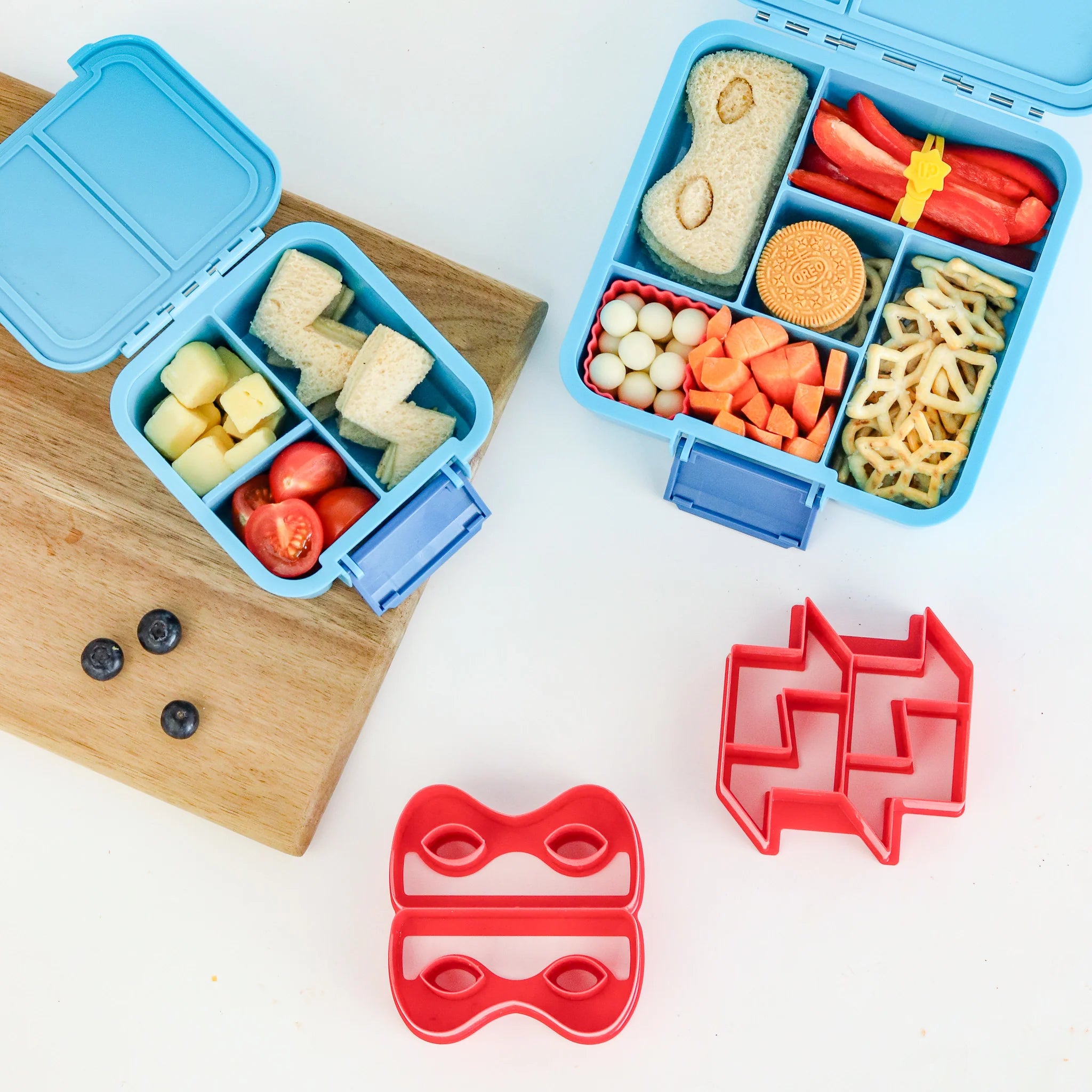 Inside view of MontiiCo Bento Two Coastal lunchbox showing leakproof compartments