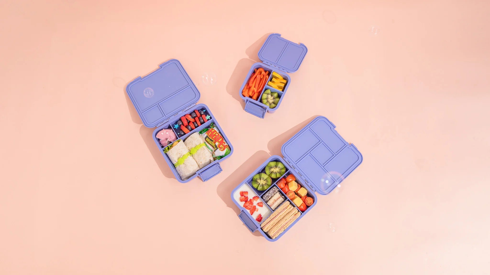 MontiiCo Bento Two lunchbox in Splash – open showing compartments