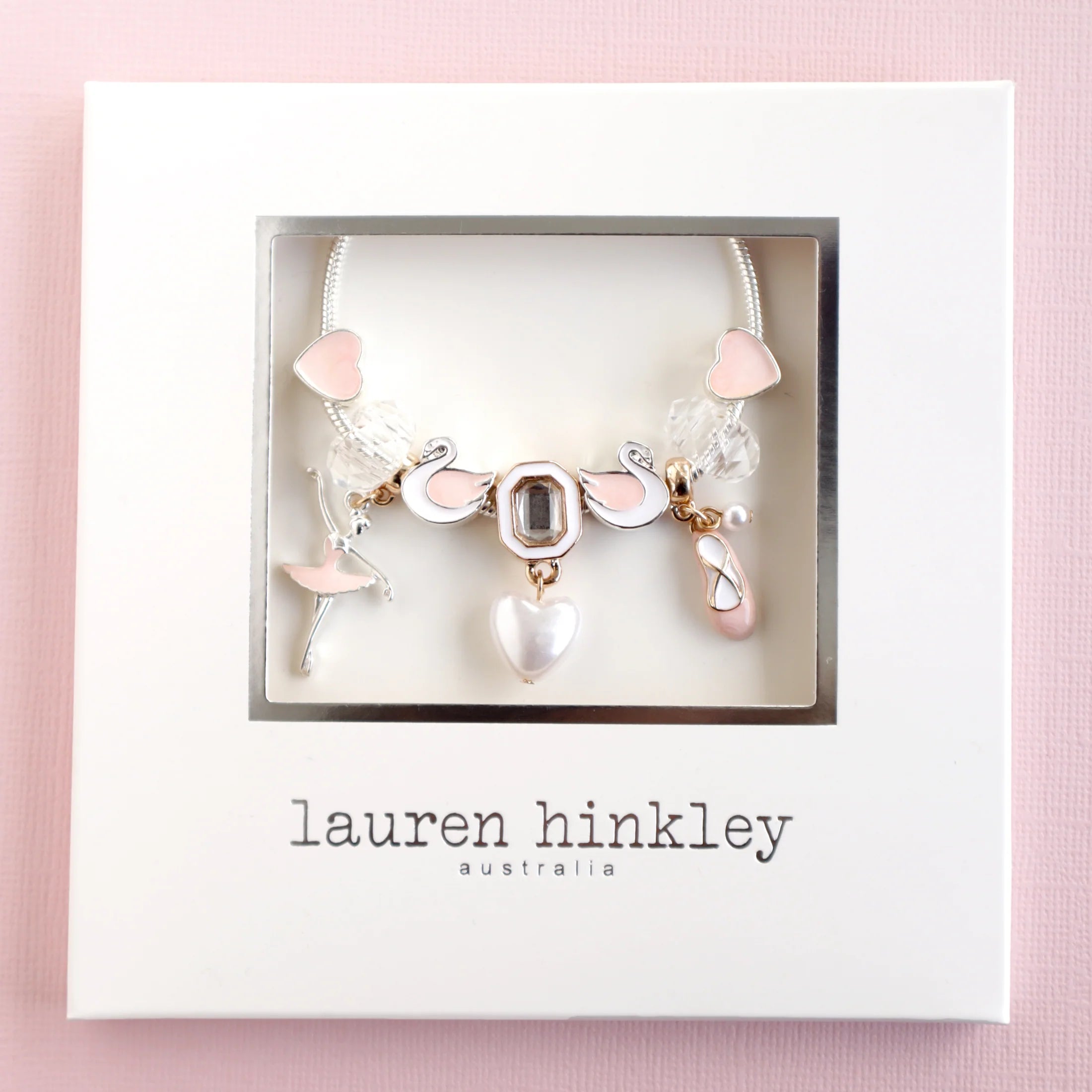 Lauren Hinkley Swan Lake Charm Bracelet featuring Princess Odette, two swan maidens, and a pearl-like heart charm – children’s jewellery gift